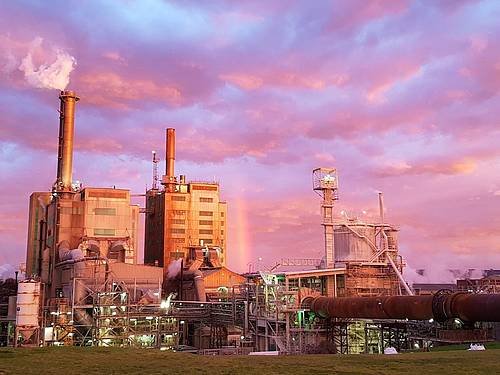 Australian Paper plant view with paper machines, pulp mills, recycling plants and lime rotary kiln