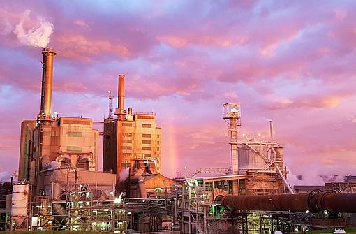 Australian Paper plant view with paper machines, pulp mills, recycling plants and lime rotary kiln